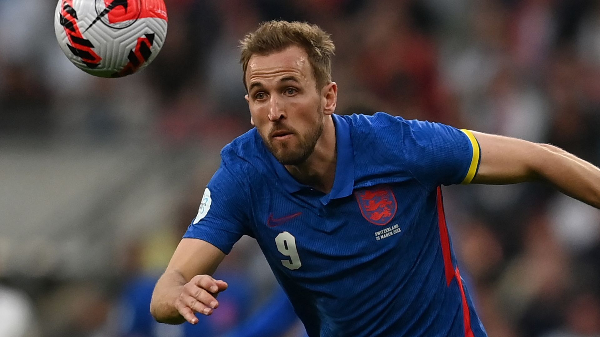 Why are England playing without names on their blue kits against Switzerland Goal US