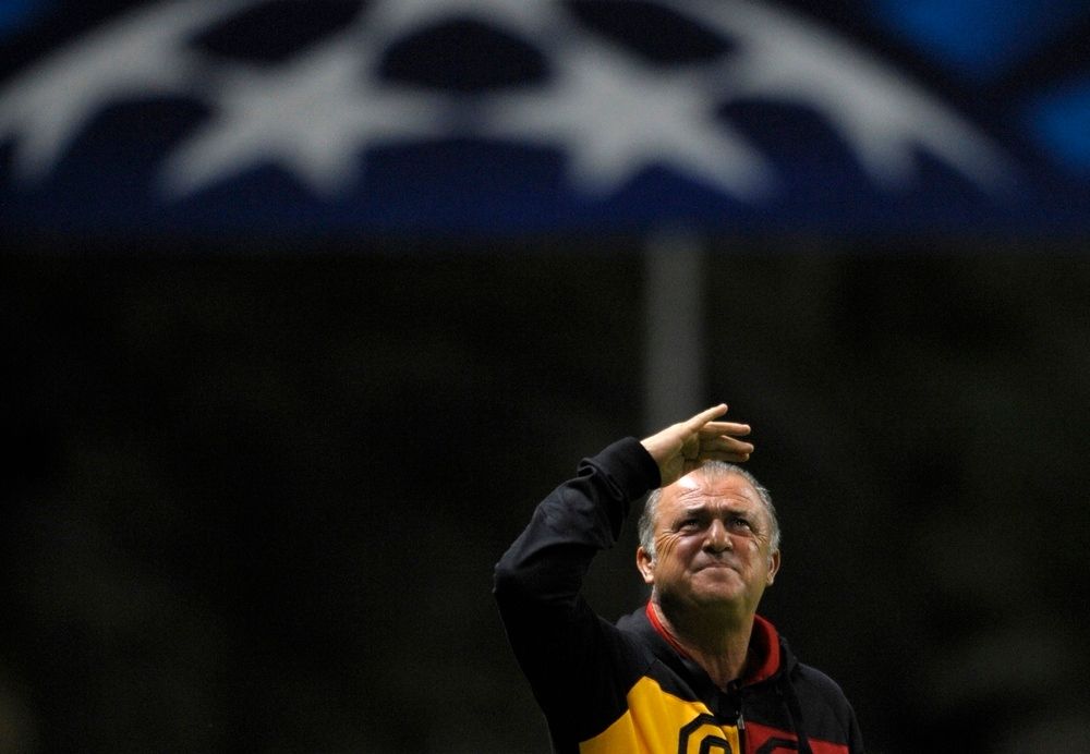 Fatih Terim under Champions League logo