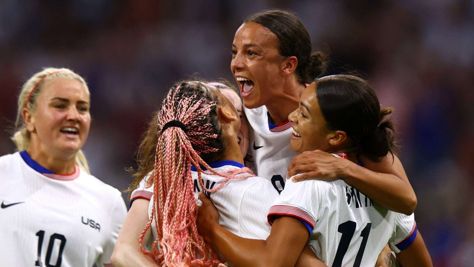 Swanson celebrate USWNT Germany
