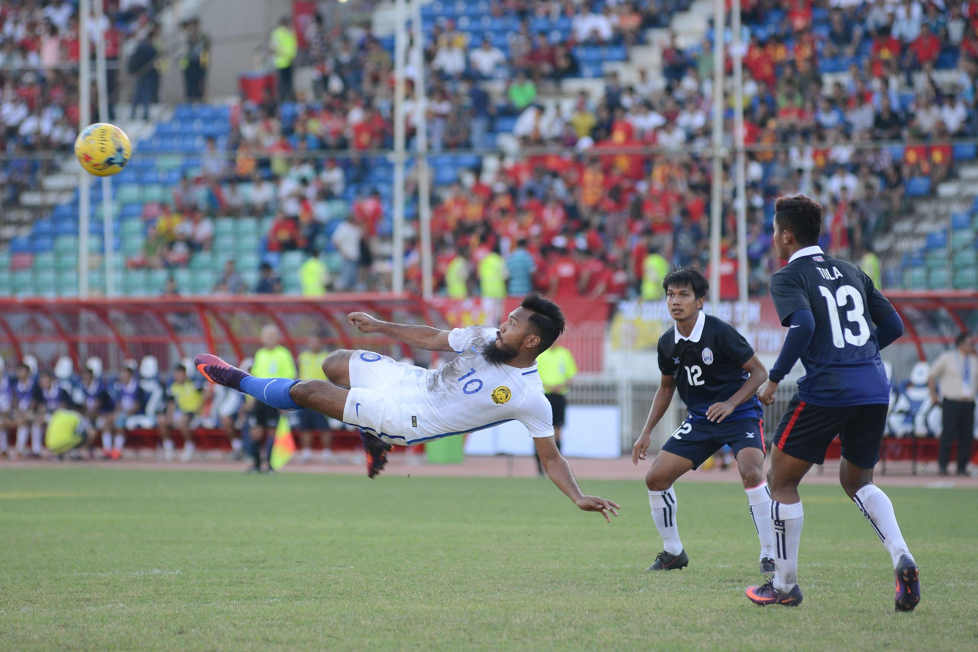 Safee Sali attempting a scissors kick against Cambodia in the 2016 AFF Suzuki Cup 20/11/16
