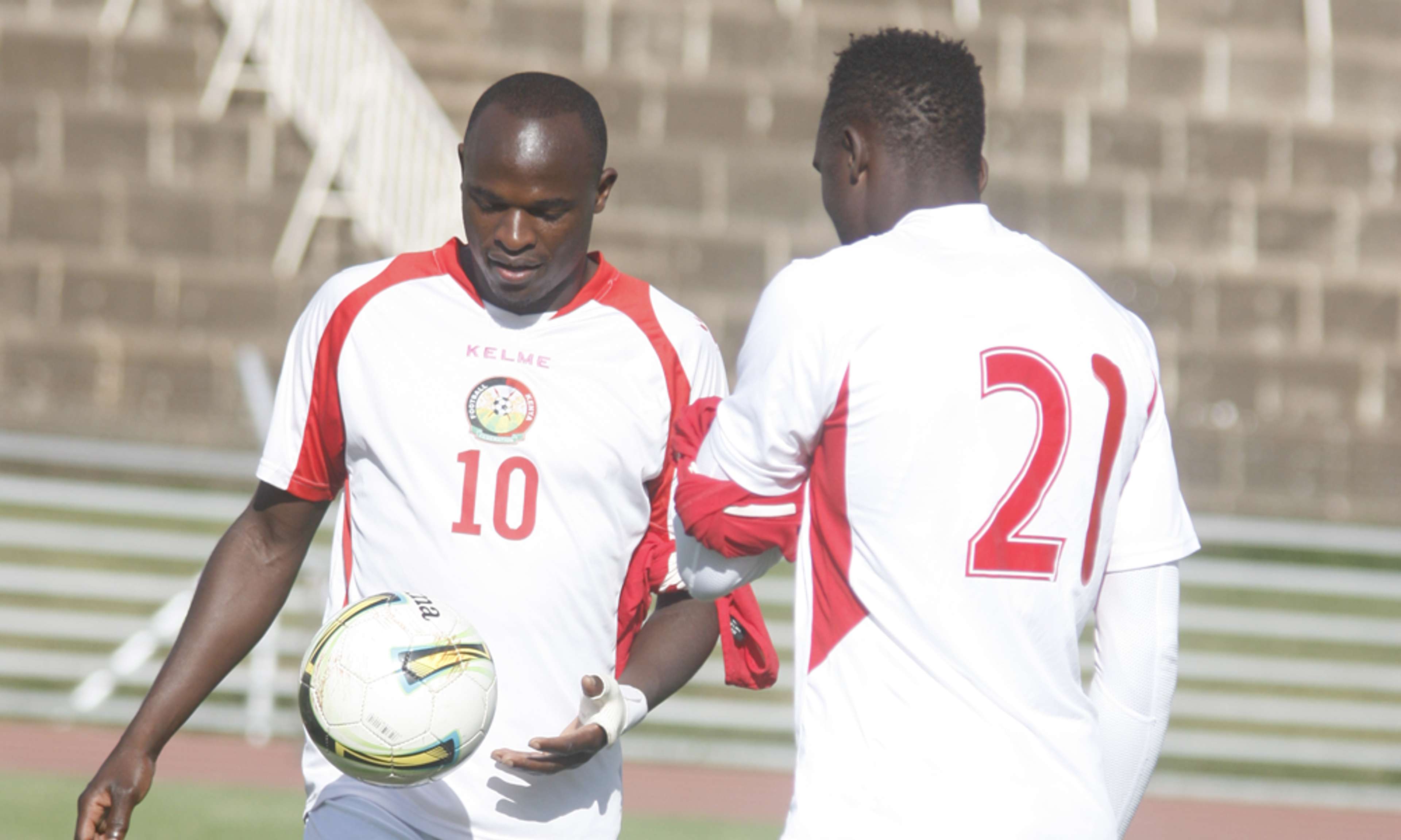 Kenya striker Dennis Oliech and Mariga
