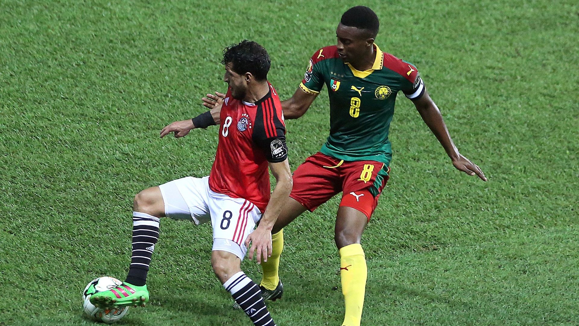 Tarek Hamed of Egypt and Cameroon's Benjamin Moukandjo