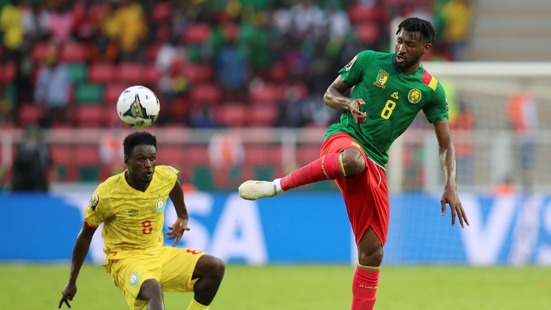 Stephane Bahoken of Cameroon challenged by Amanuel Yohannes Gamo of Ethiopia.