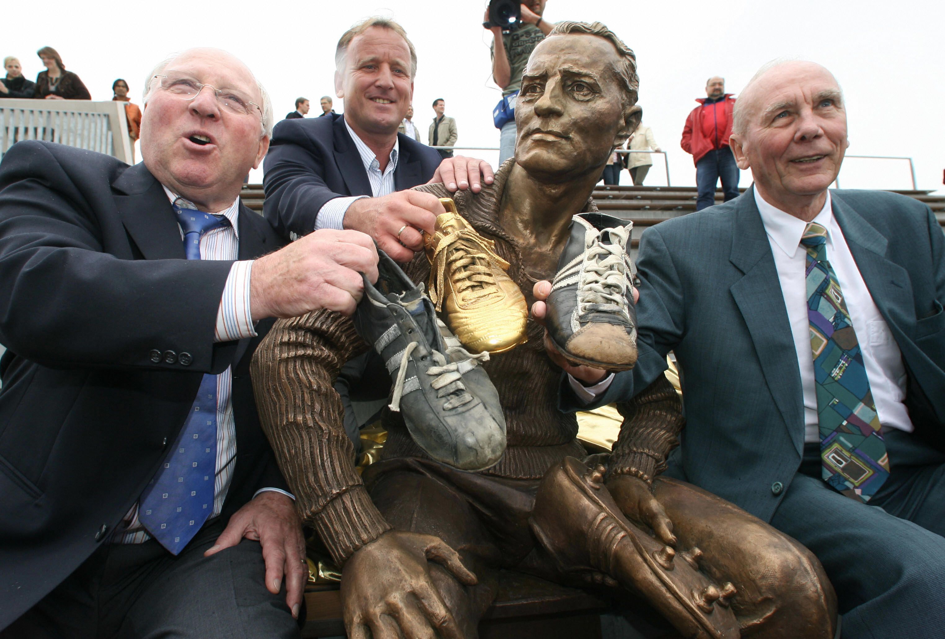 Former German football stars (L-R) Uwe S