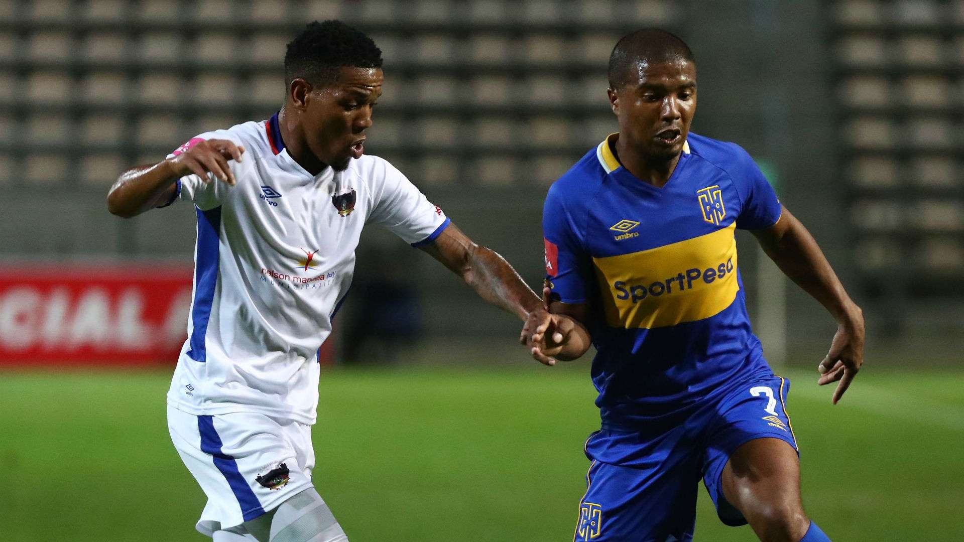 Lyle Lakay of Cape Town City evades challenge from Sizwe Mdlinzo of Chippa United