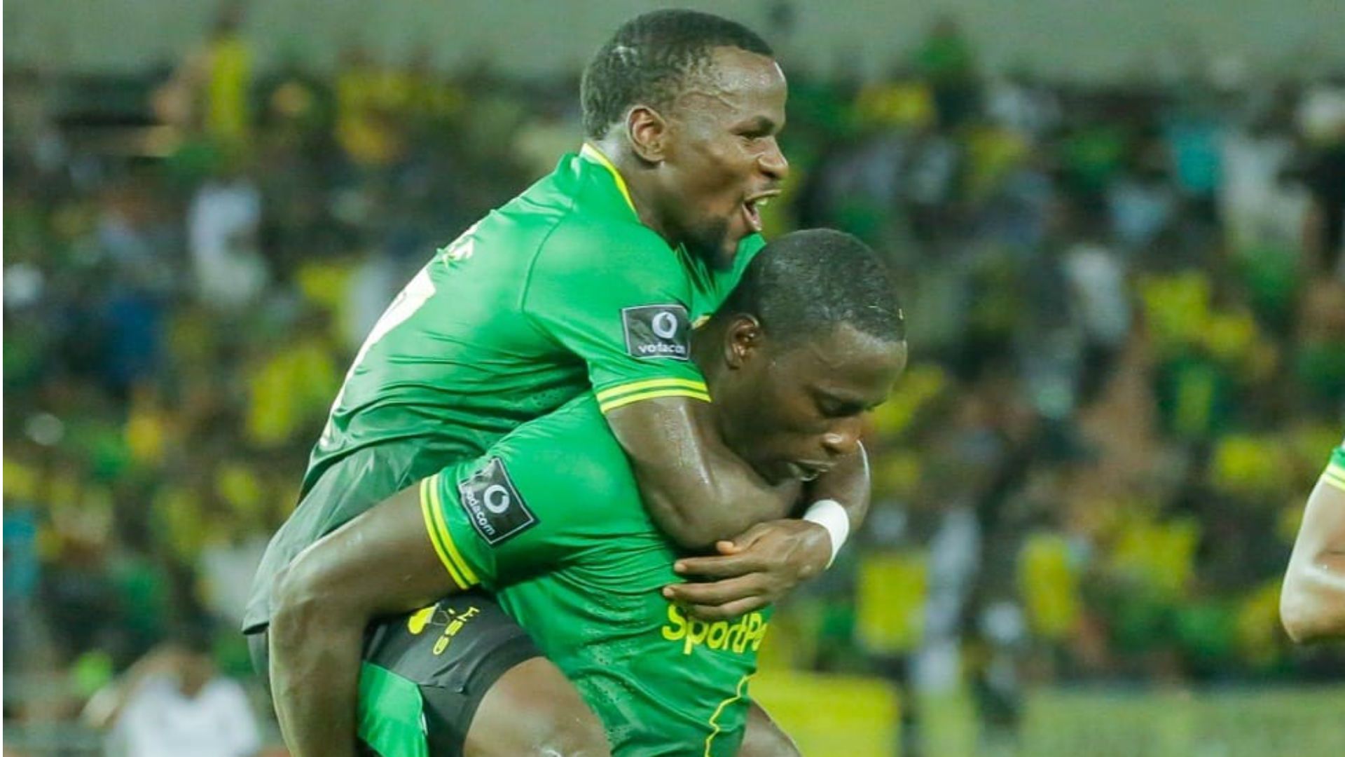Deus Kaseke and Michael Sarpong of Yanga SC.