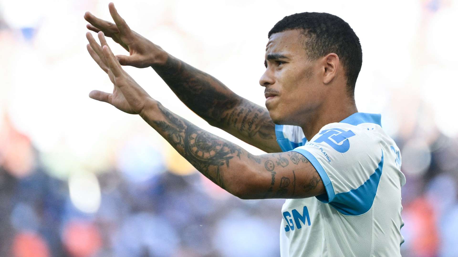 Marseille's English forward #10 Mason Greenwood celebrates