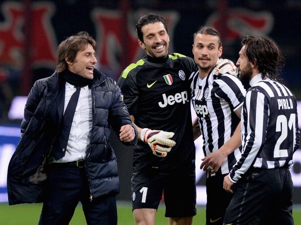 Buffon celebrates with Conte