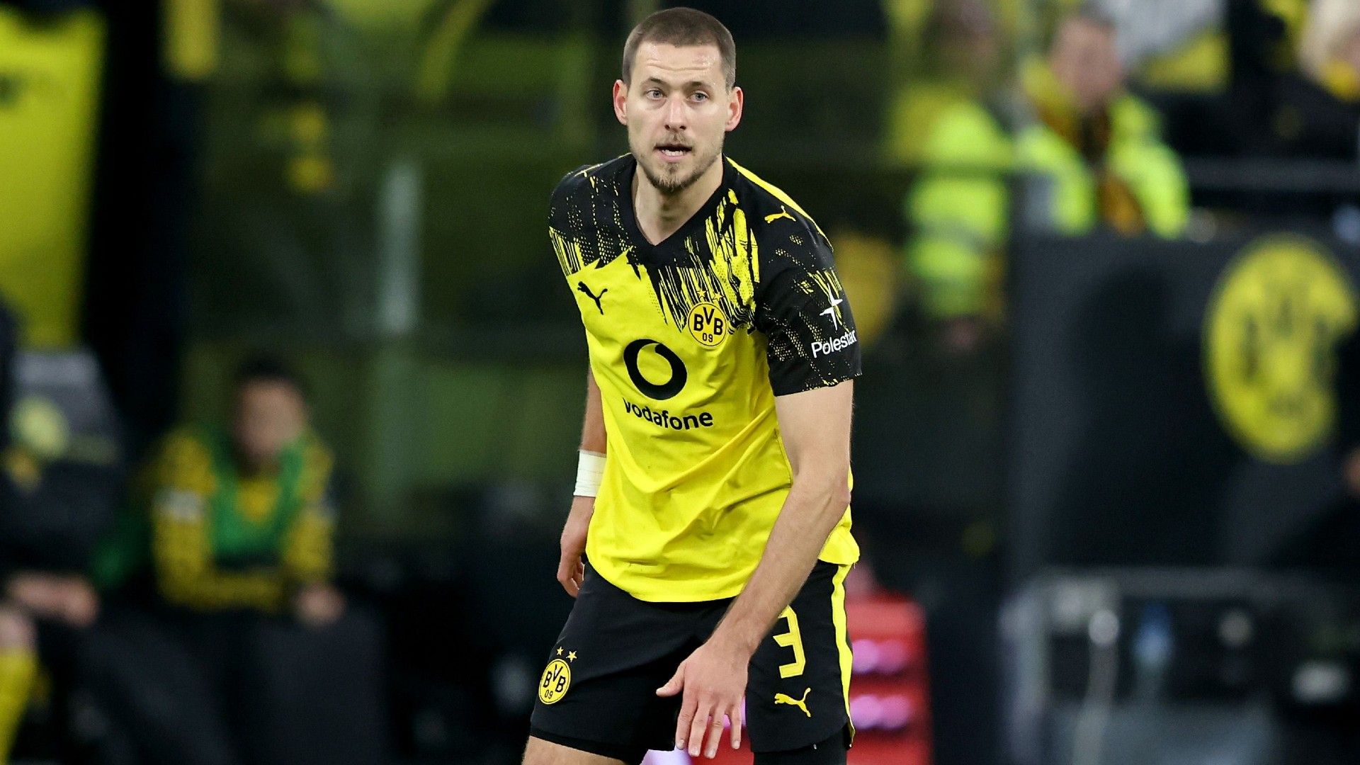 Waldemar Anton of Borussia Dortmund runs with the ball 