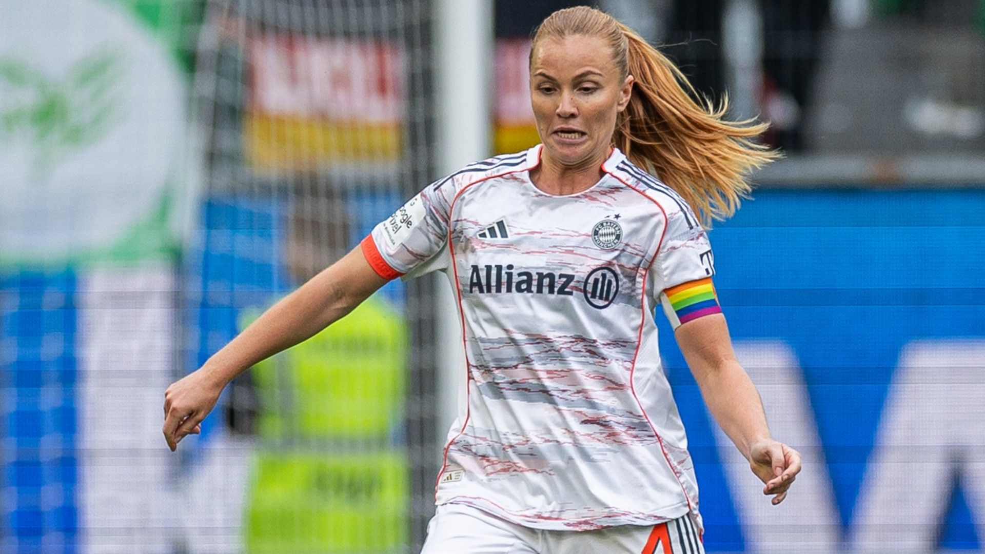 Glodis Perla Viggosdottir of Bayern Muenchen runs with the ball 