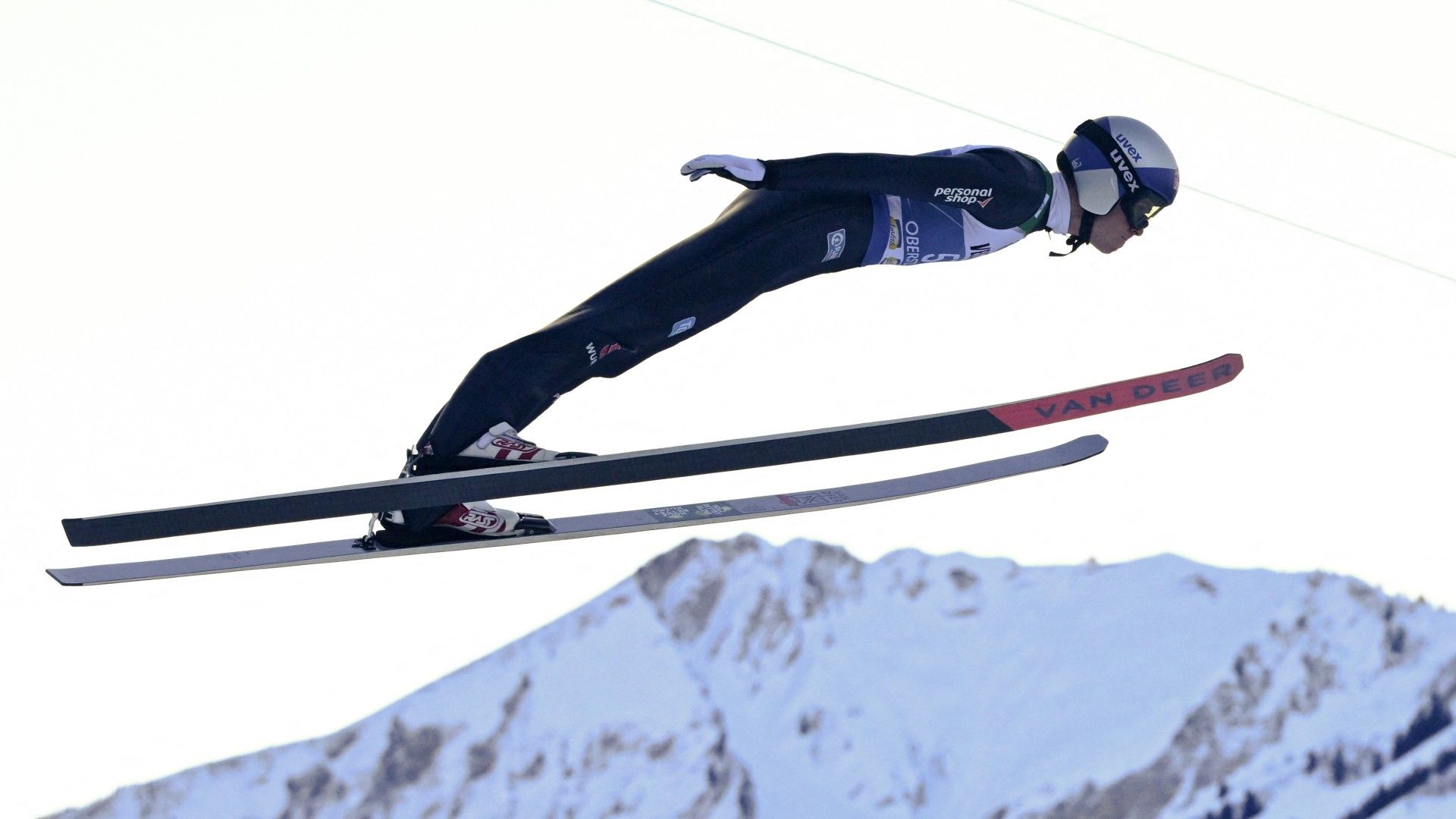 Germany's Andreas Wellinger soars through the air  