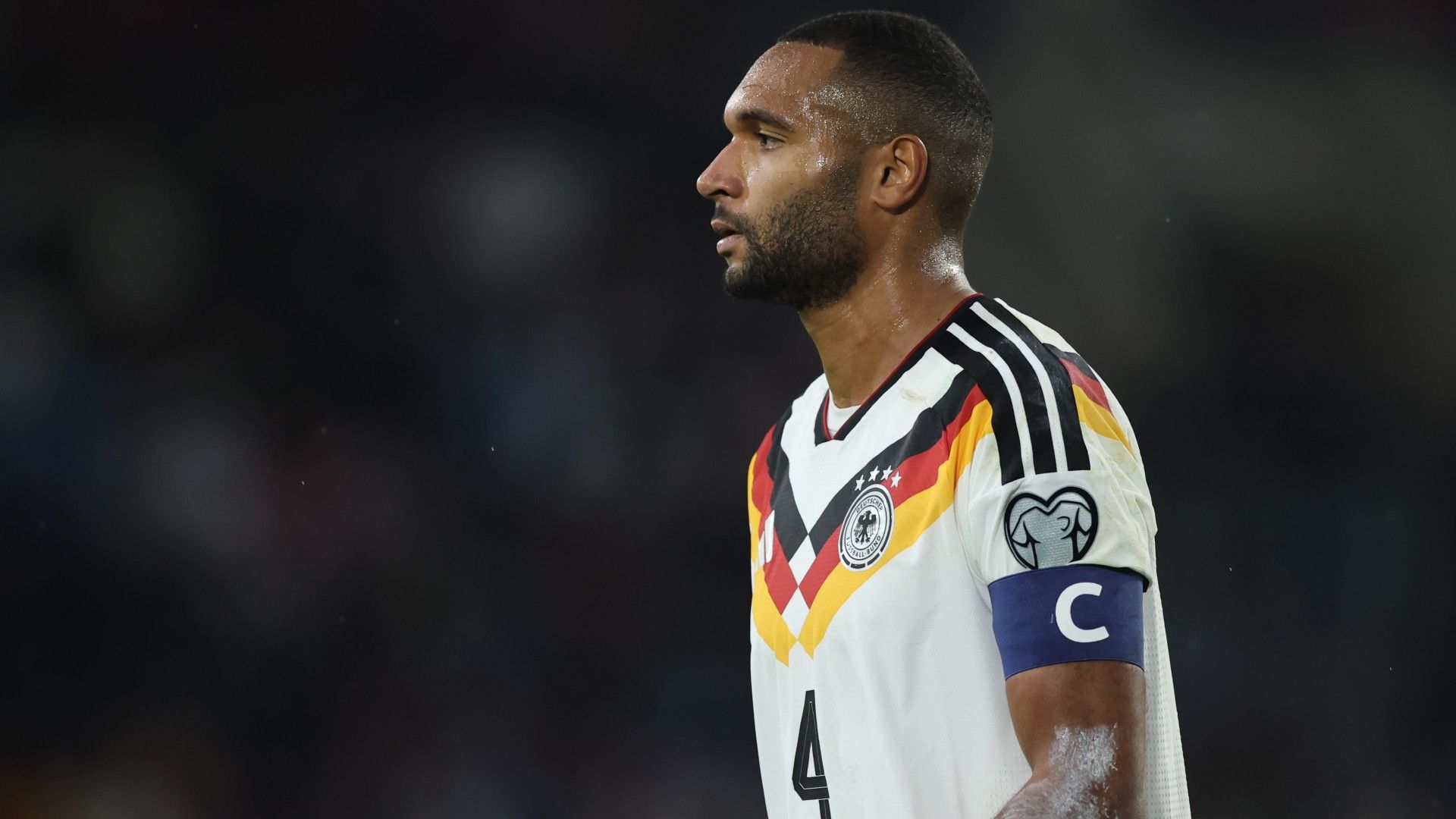 Jonathan Tah of Germany reacts