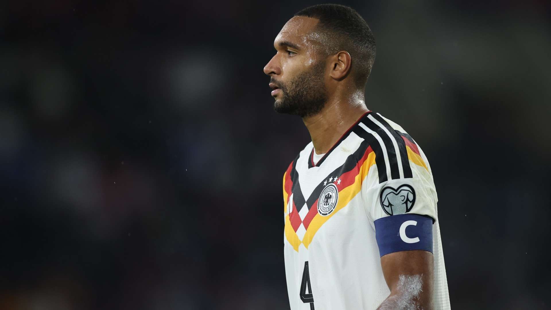 Jonathan Tah of Germany reacts