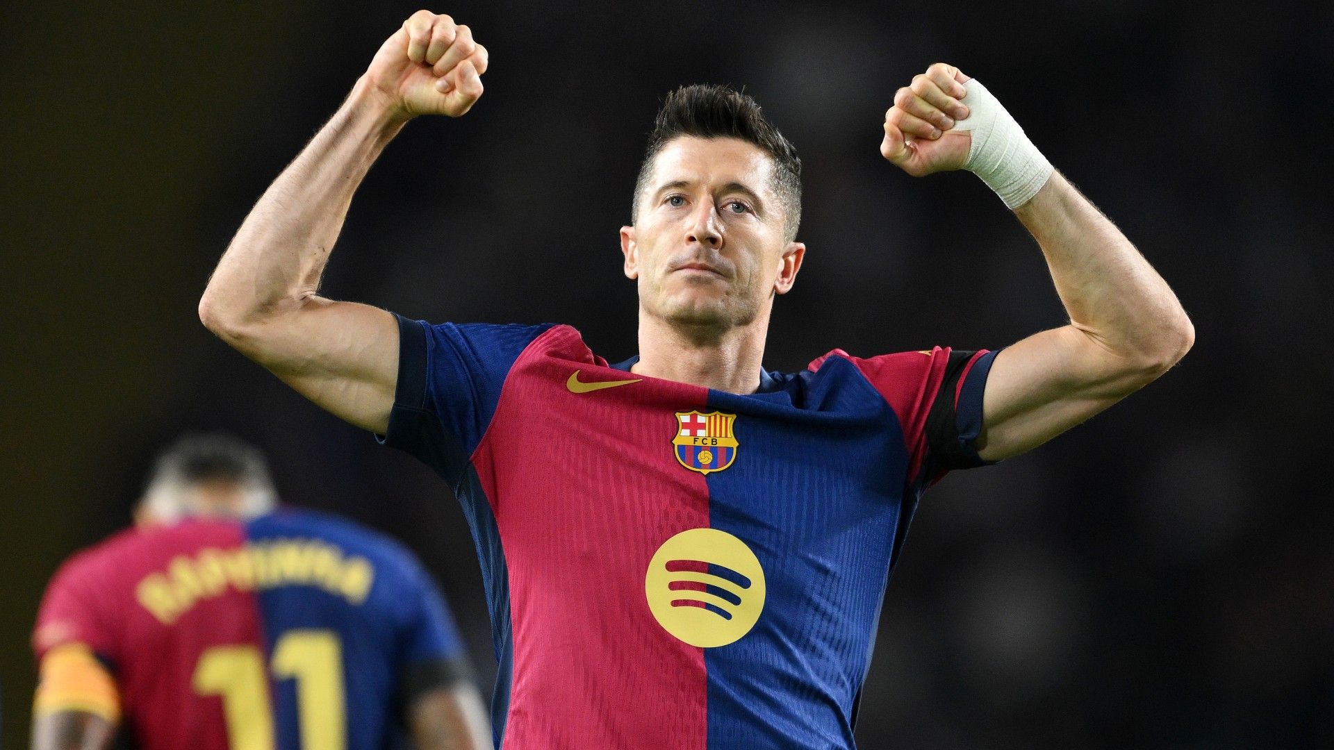 Robert Lewandowski of FC Barcelona celebrates scoring 