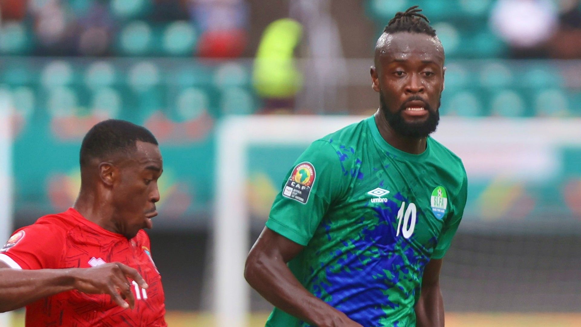 Equatorial Guinea captain Emilio Nsue Lopez and Kei Kamara of Sierra Leone.