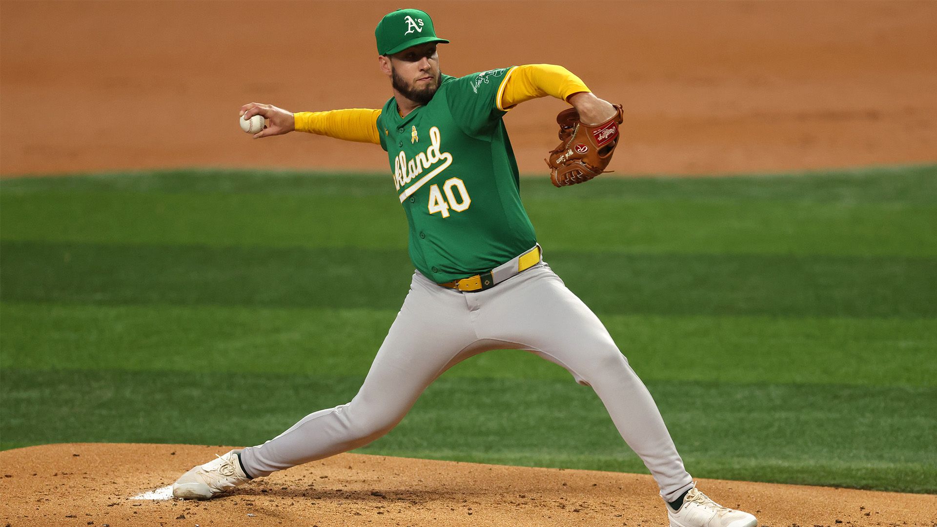 Mitch Spence #40 of the Oakland Athletics pitches