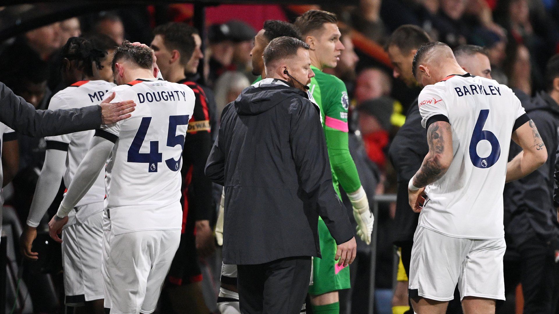 Luton Town players leave field 2023-24