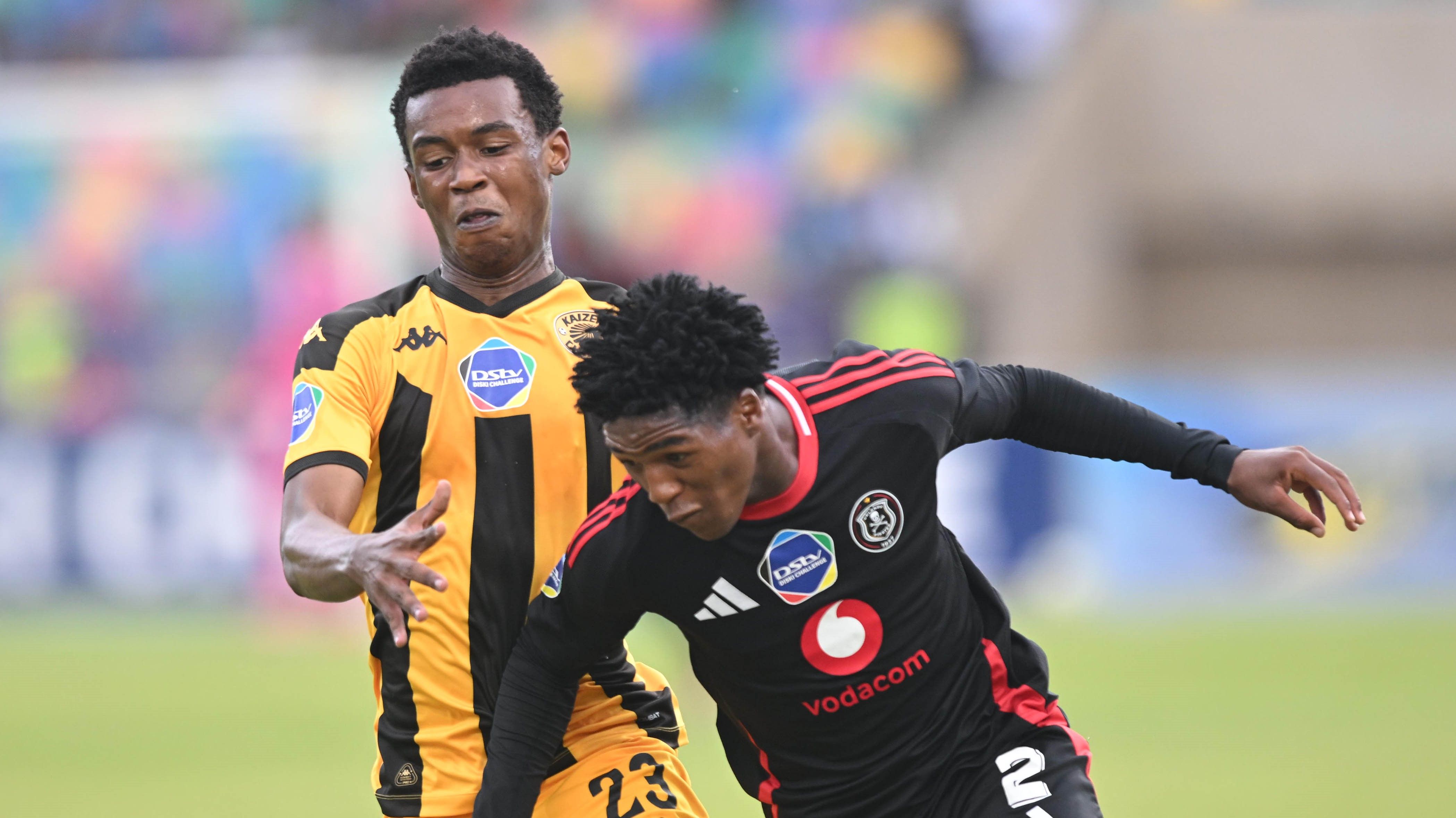 Tshepo Mlambi of Orlando Pirates challenges Siyabonga Gumede of Kaizer Chiefs in Diski Challenge encounter