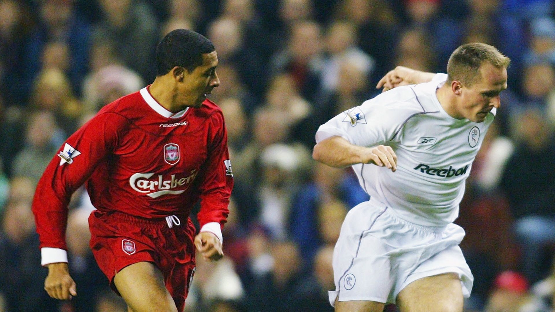 Jon Otsemobor and Henrik Pedersen of Bolton during the Carling Cup fourth round match between Liverpool and Bolton Wanderers at Anfield on November 3, 2003