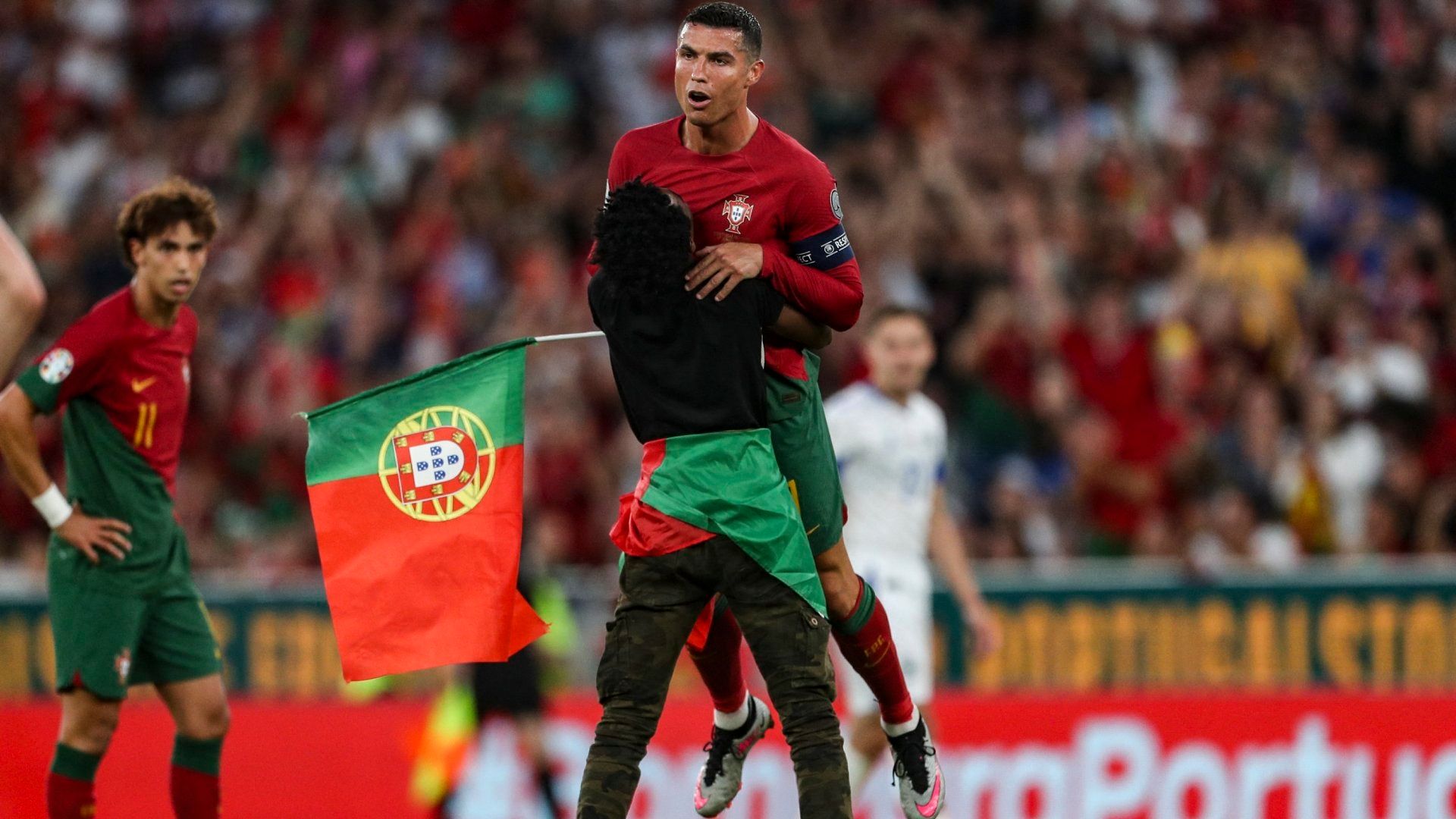 Cristiano Ronaldo pitch invader lift Portugal Bosnia-Herzegovina 2023
