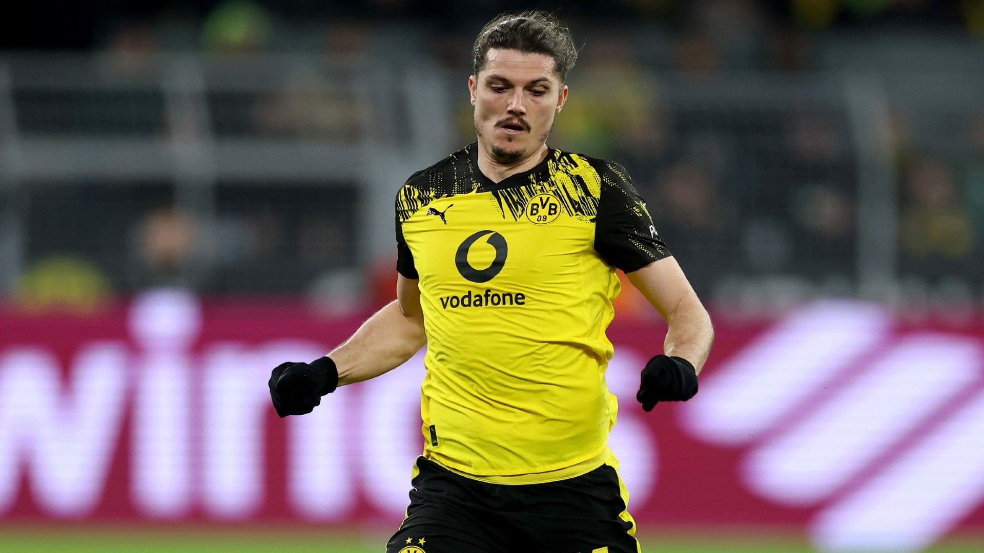 Marcel Sabitzer of Borussia Dortmund runs with the ball