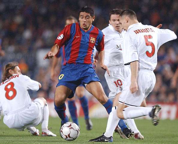 Juan Roman Riquelme Barcelona Vladimir Maminov Sergey Ignashevich Dmitry Loskov Lokomotiv Moscow UEFA Champions League 2002