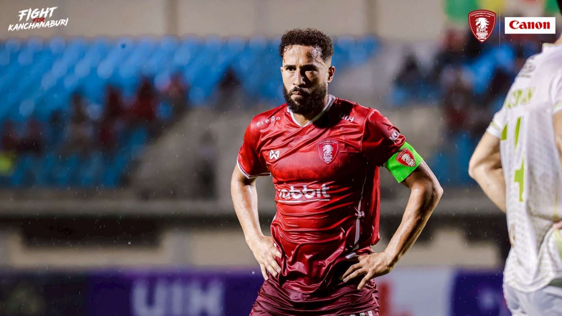 Football team celebrating survival in league