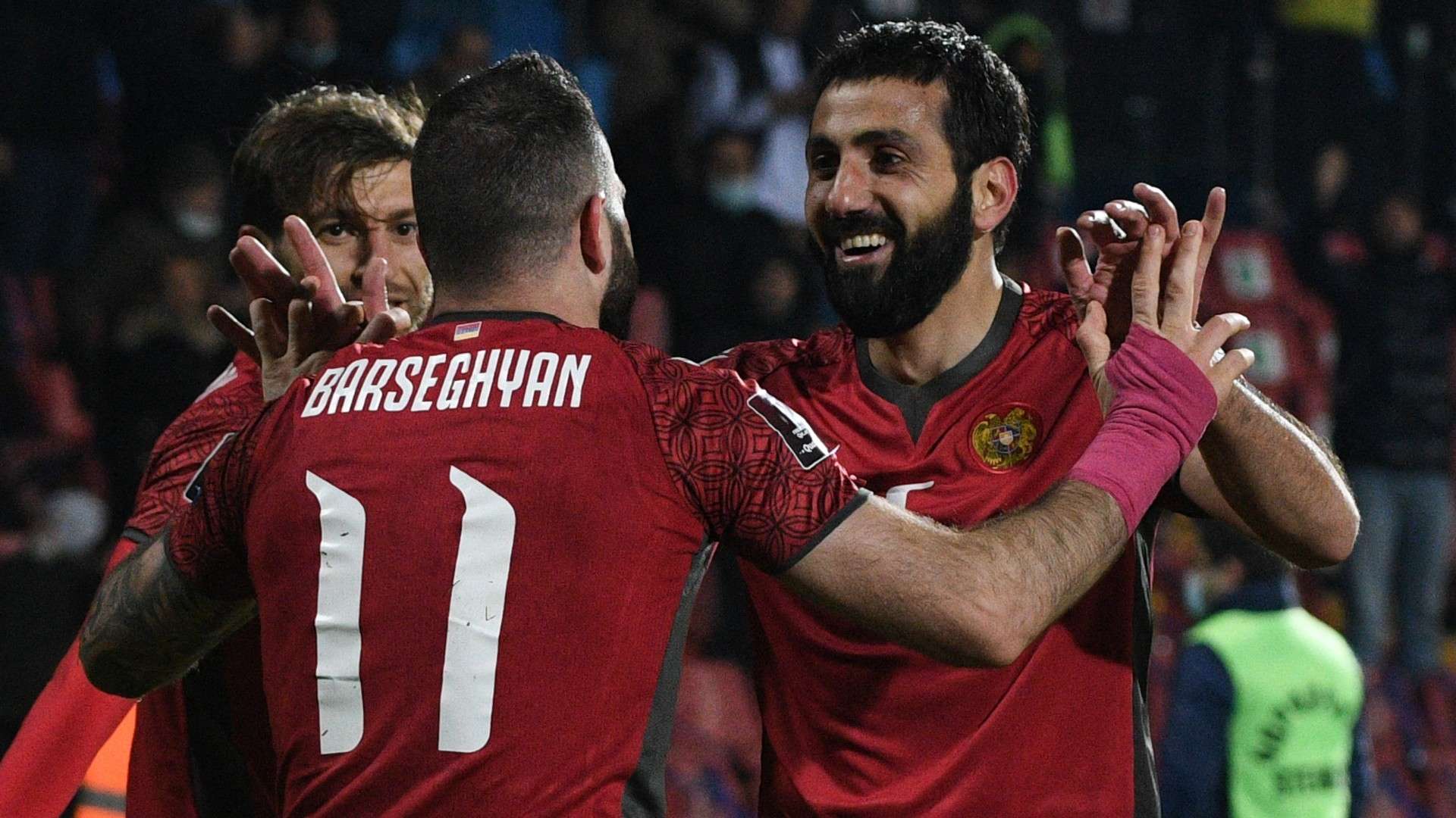 Armenia's midfielder Tigran Barseghyan celebrates with teammates