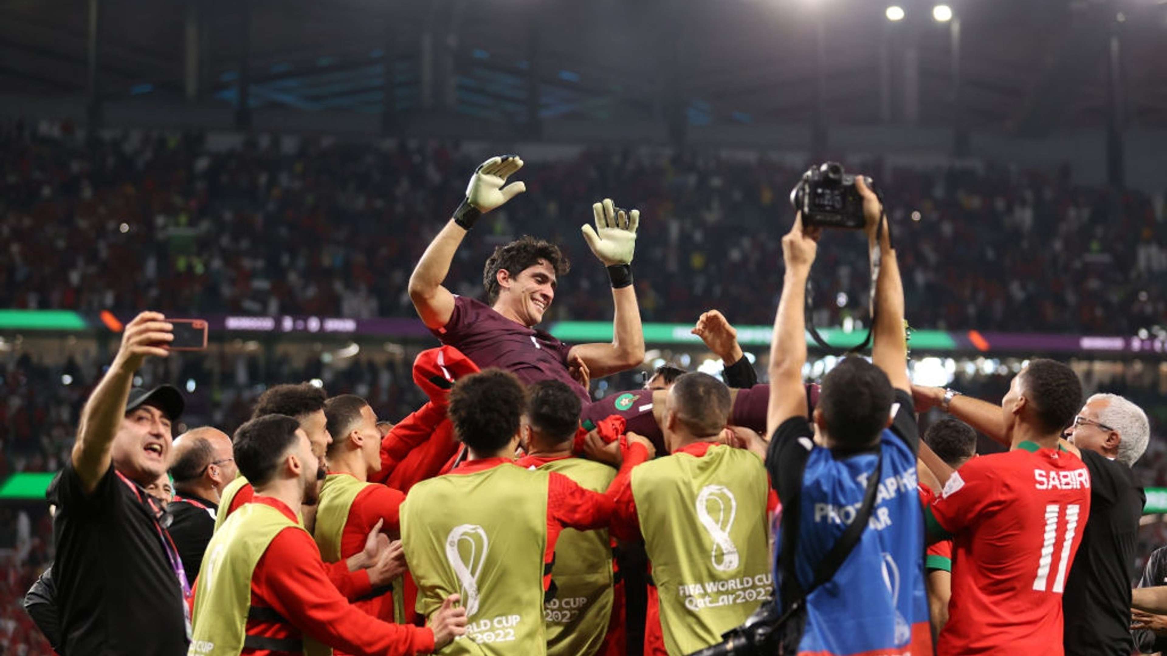 Yassine Bounou celebrates with teammates.