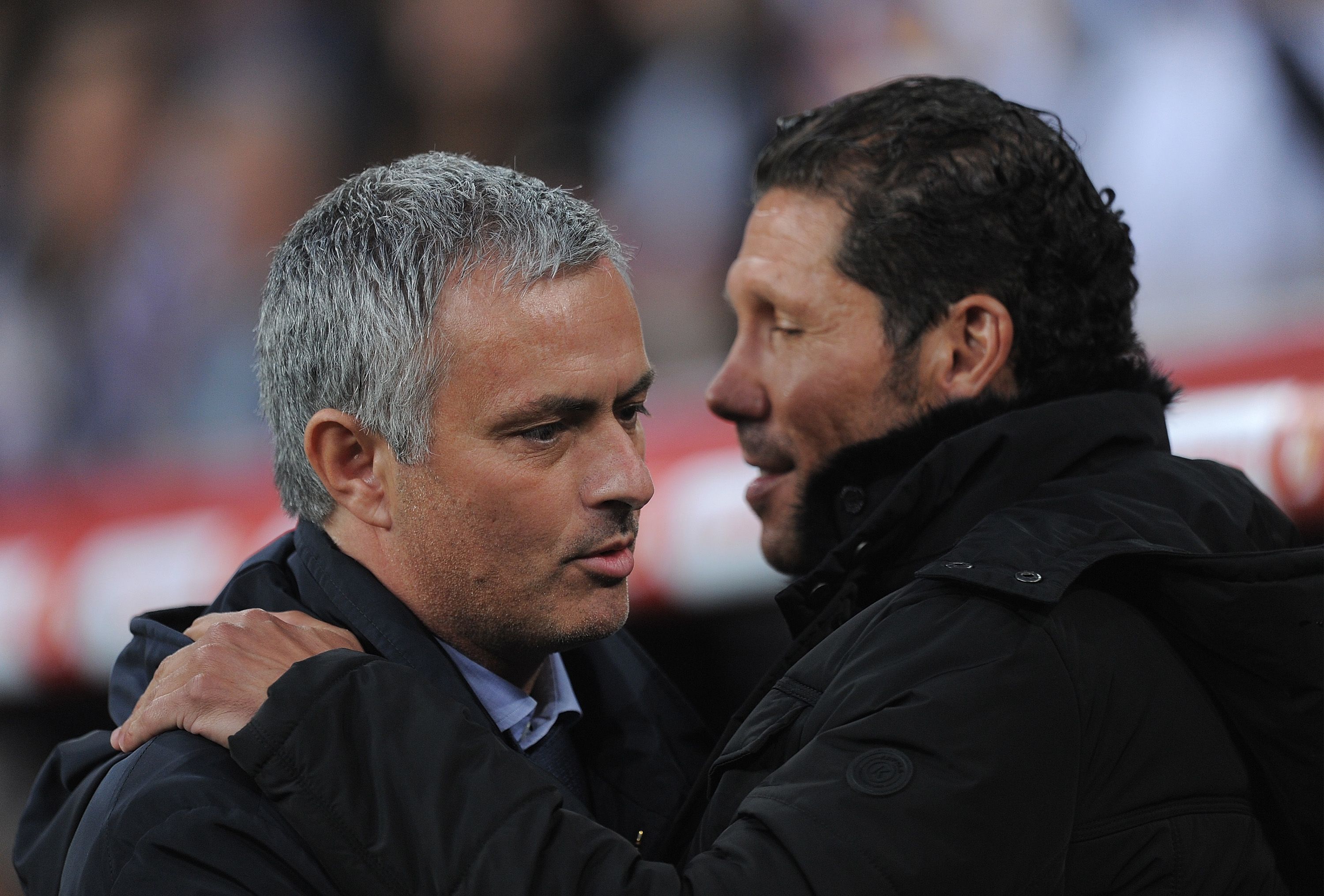 Chelsea's Jose Mourinho and Atletico Madrid's Diego Simeone embrace