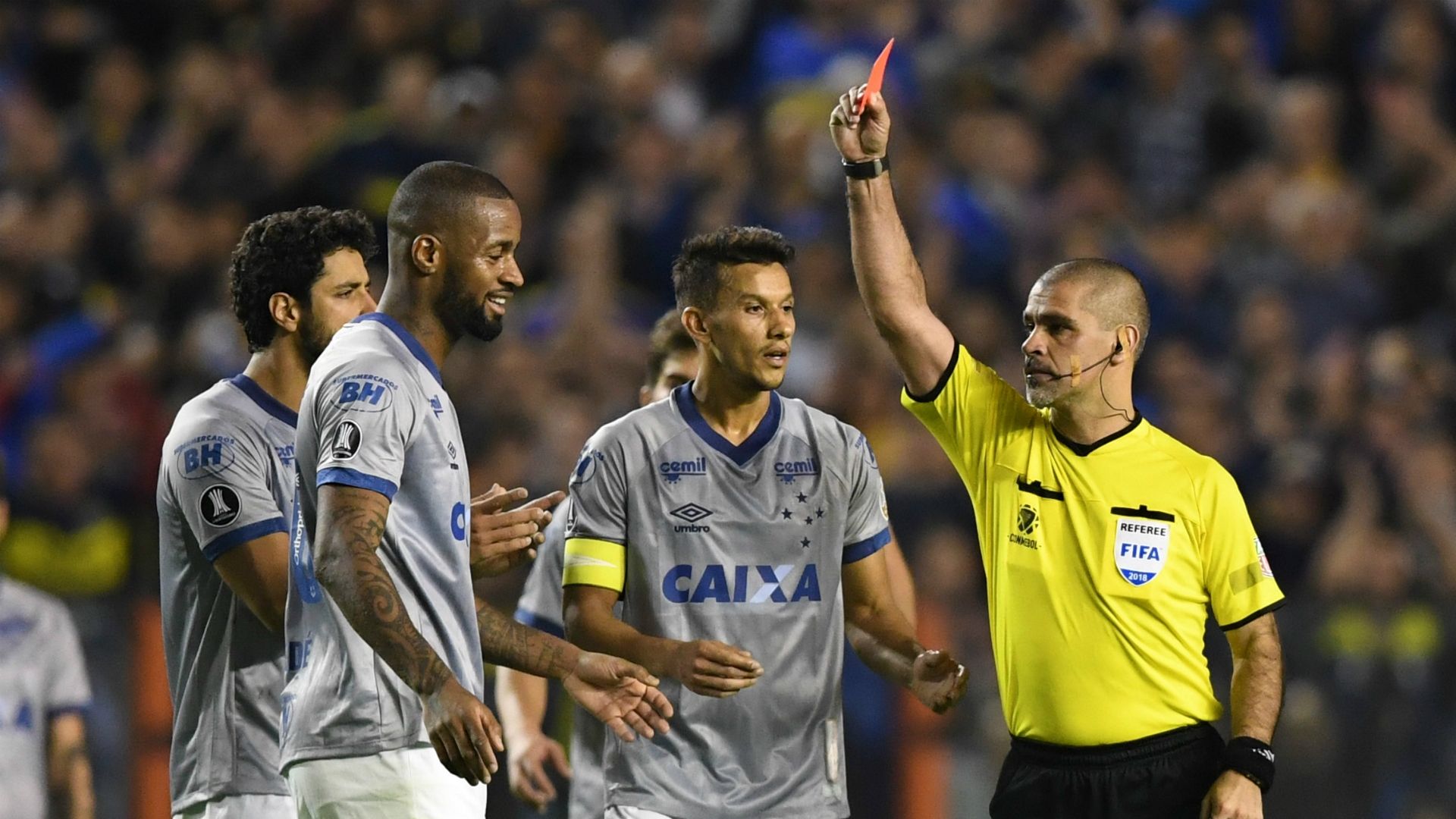 Paraguayan referee Eber Aquino shows a red card to Cruzeiro's Brazilian defender Dede Boca Juniors vs Cruzeiro Copa Libertadores 09192018