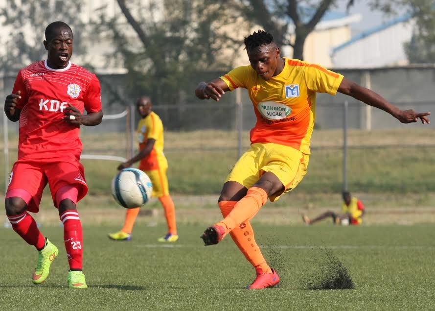 Ulinzi Stars striker Ezekiel Otuoma battles a Muhoroni Youth player