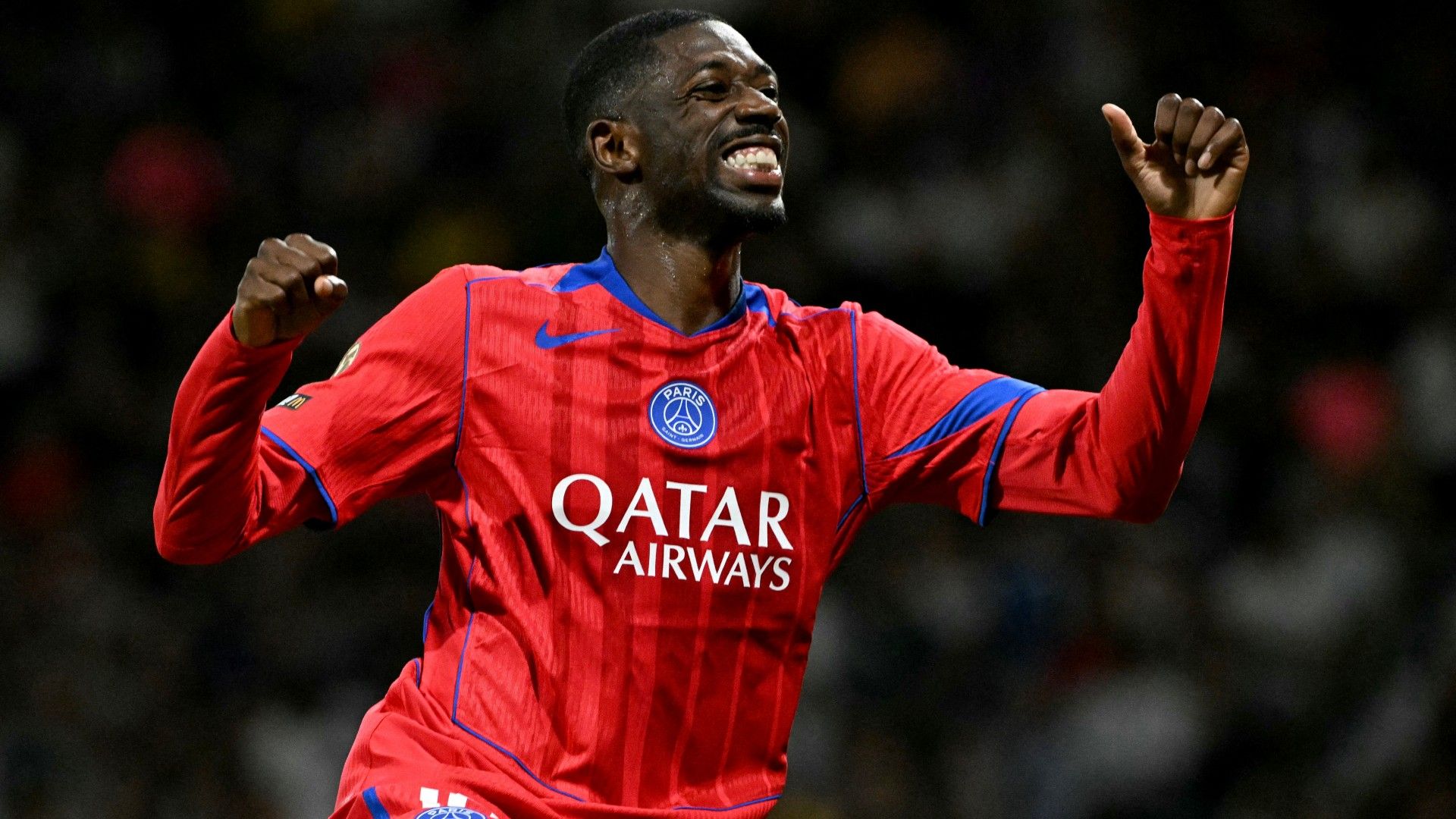 Paris Saint-Germain's French forward #10 Ousmane Dembele celebrates scoring 