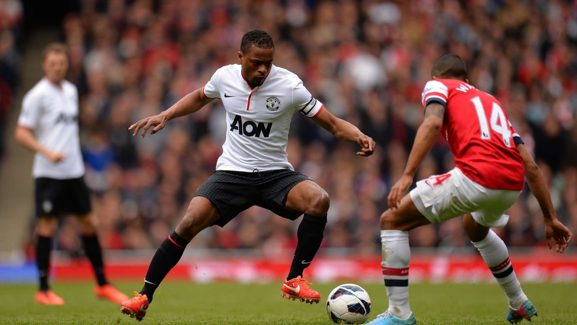 Theo Walcott Patrice Evra Manchester United