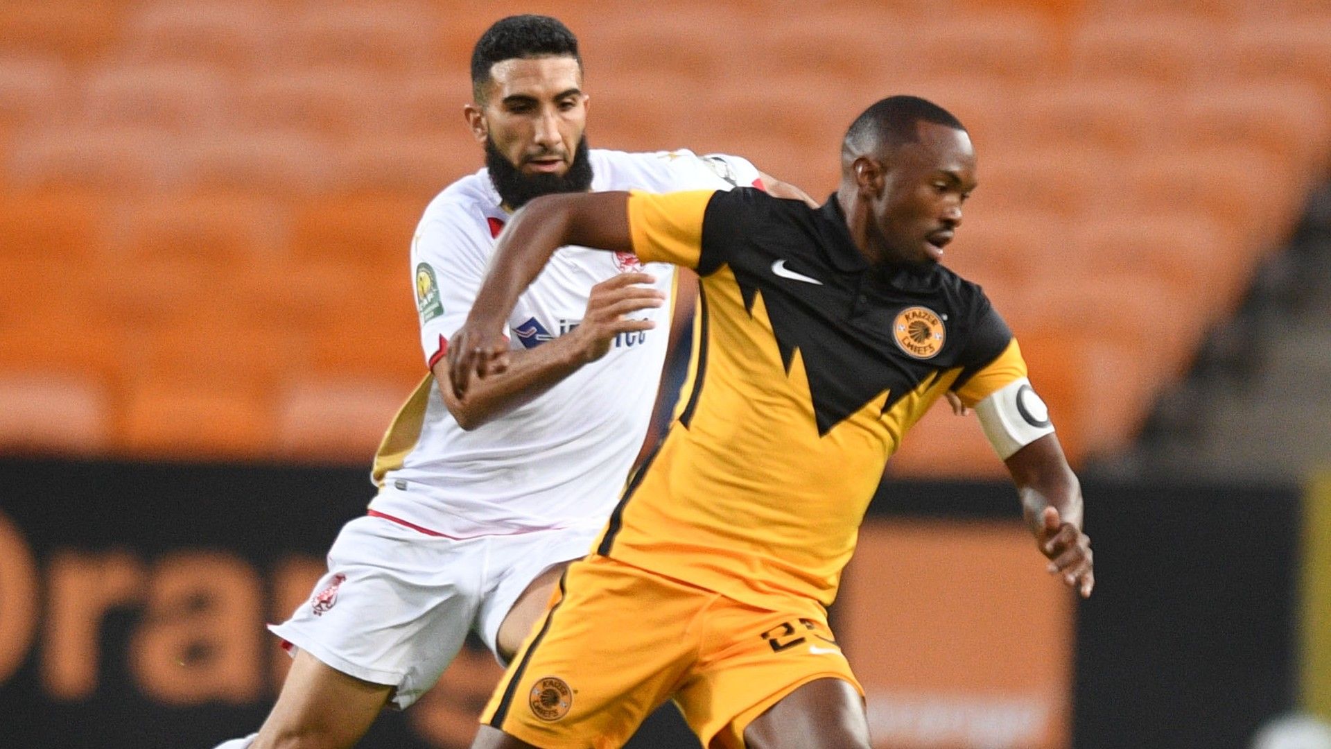 Bernard Parker of Kaizer Chiefs challenged by Sofian Yanis El Moudane of Wydad Casablanca, April 2021