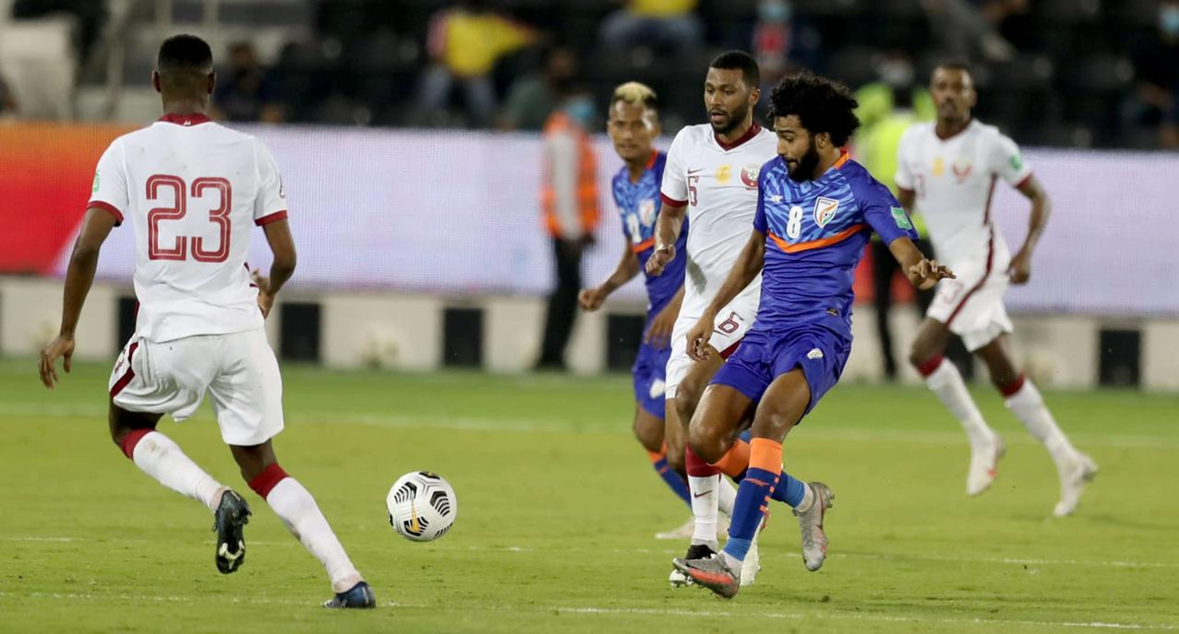 India's Glan Martins fighting for the ball against Qatar