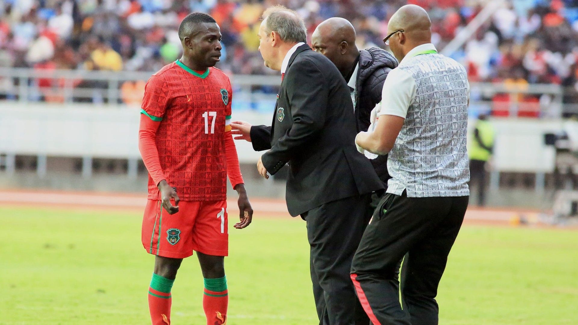 Malawi captain John Banda and Mario Marinica.