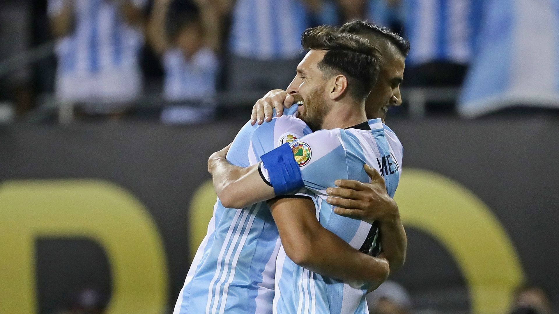 Erik Lamela and Lionel Messi