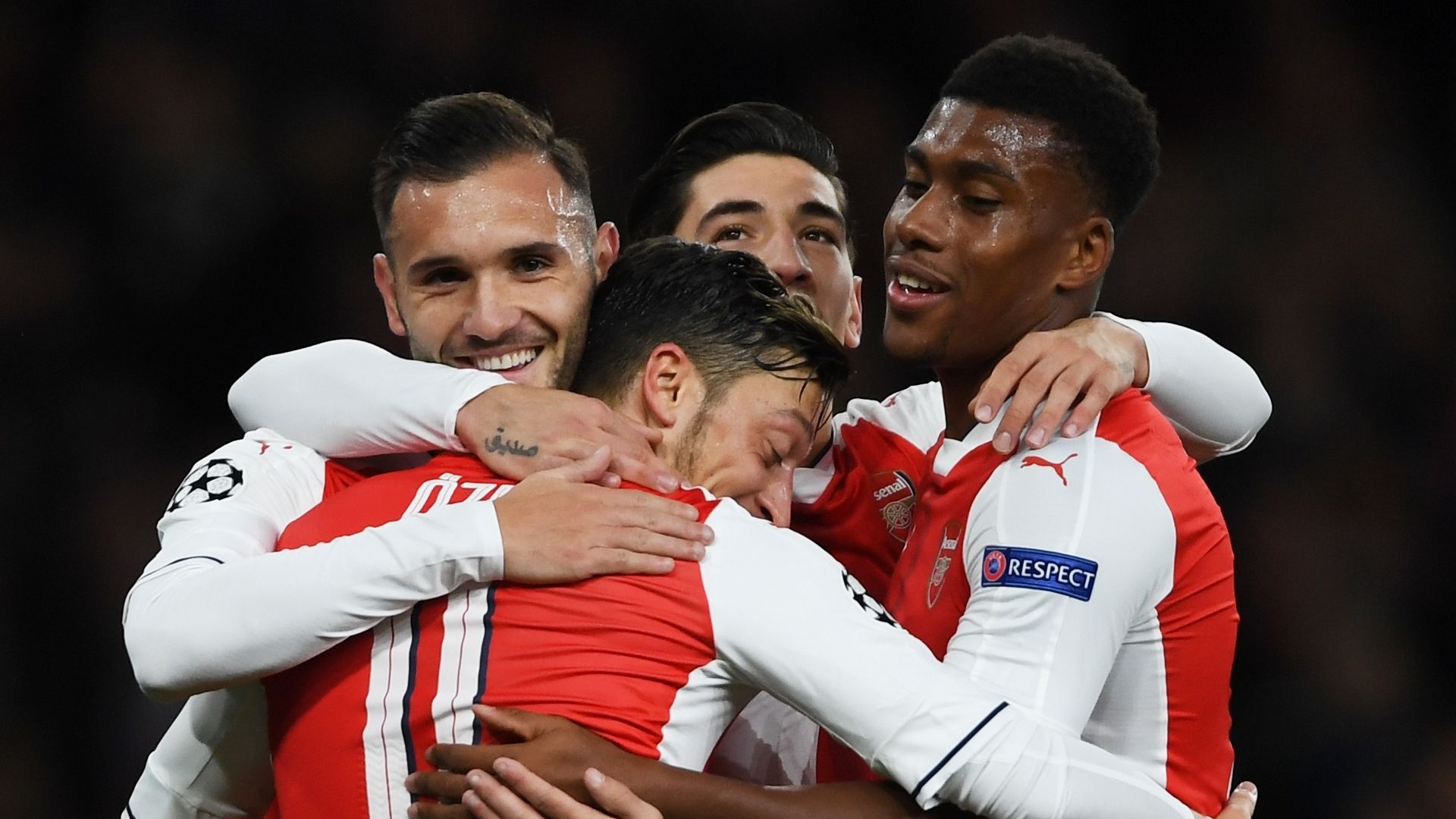 Mesut Ozil celebrates with Arsenal