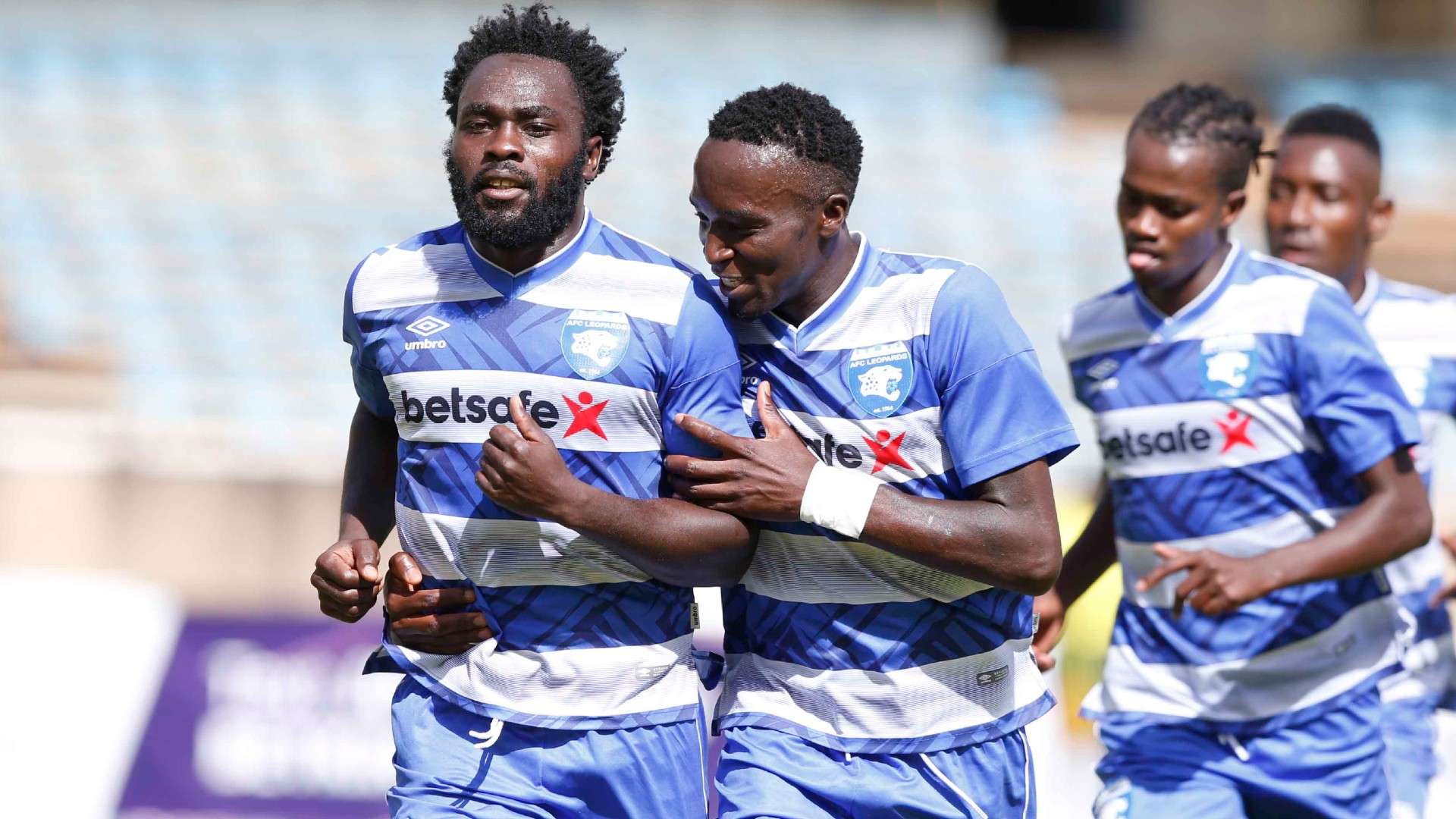 Elvis Rupia of AFC Leopards and Peter Thiongo.