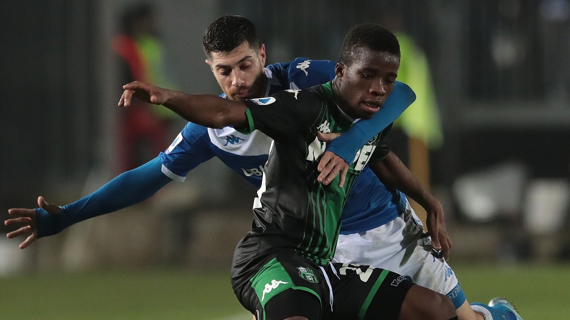Hamed Junior Traore of Sassuolo and Stefano Sabelli of Brescia Calcio