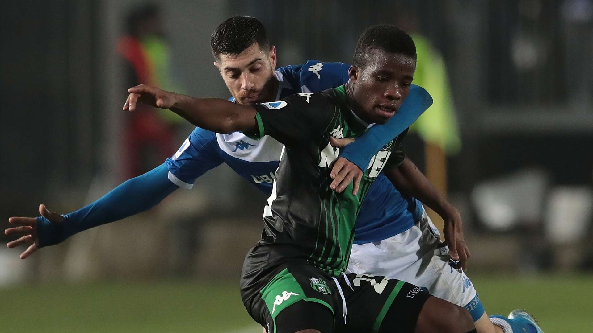 Hamed Junior Traore of Sassuolo and Stefano Sabelli of Brescia Calcio