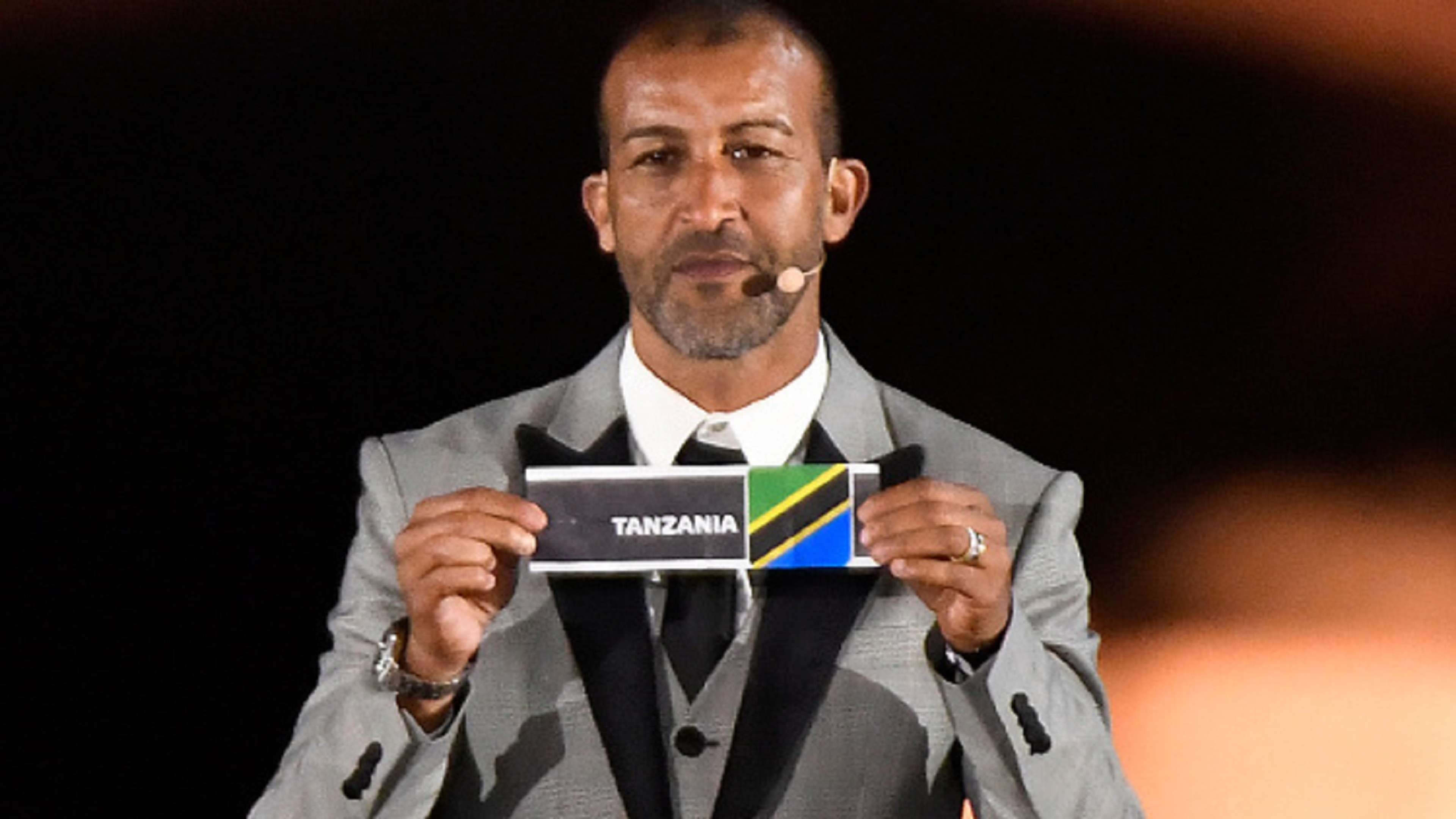Former Moroccan forward Mustapha Hadji shows Tanzania's ballot the 2019 CAF African Cup of Nations (CAN) draw