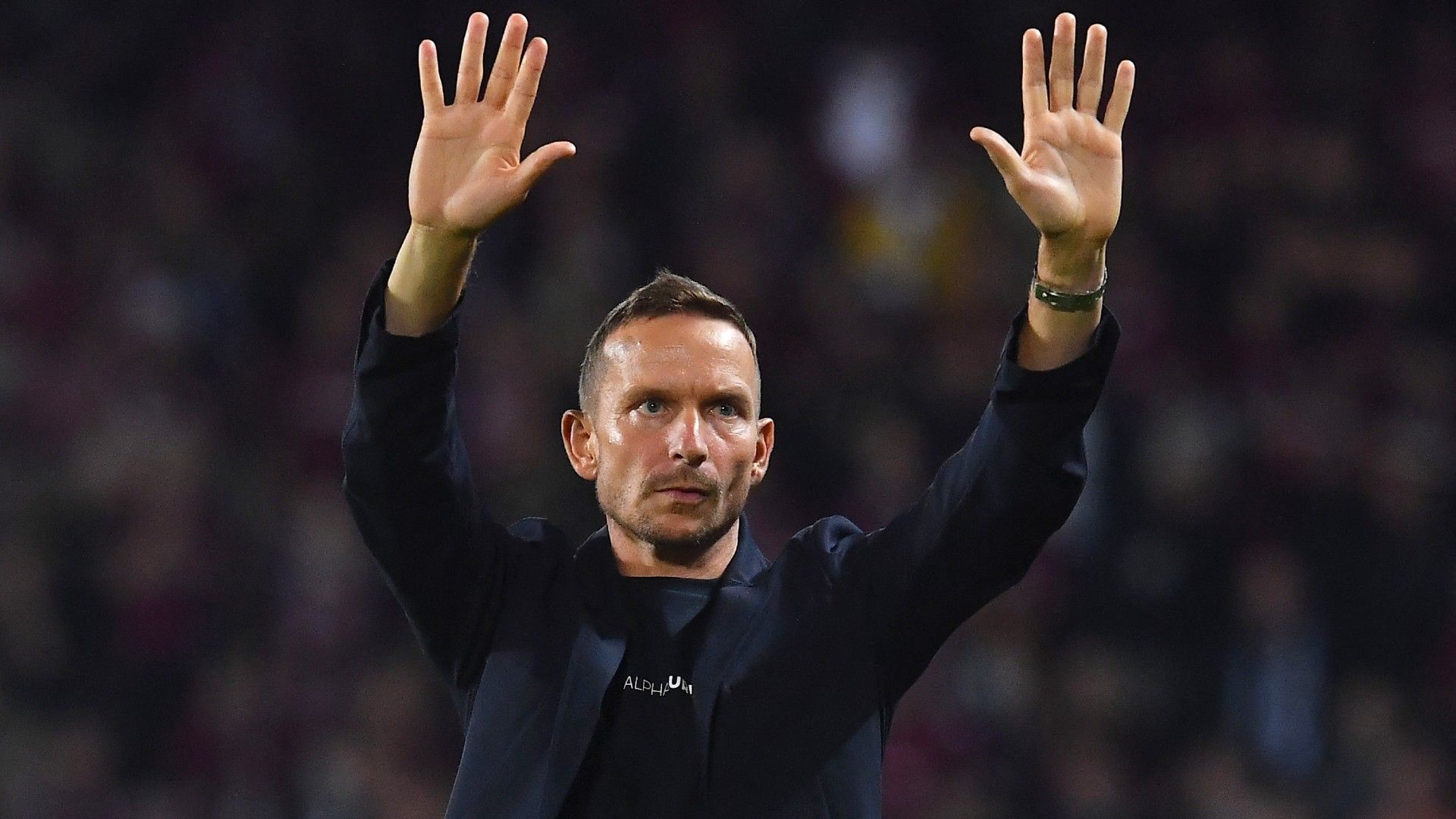 Salzburg's Dutch head coach Pepijn Lijnders acknowledges the fans 
