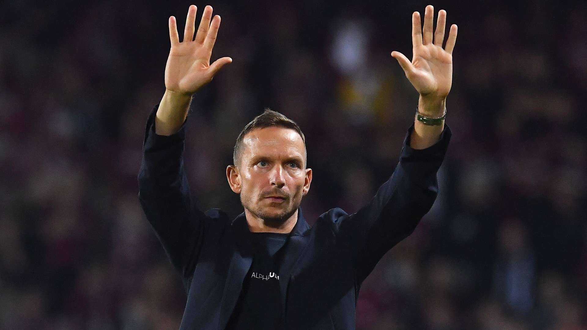 Salzburg's Dutch head coach Pepijn Lijnders acknowledges the fans