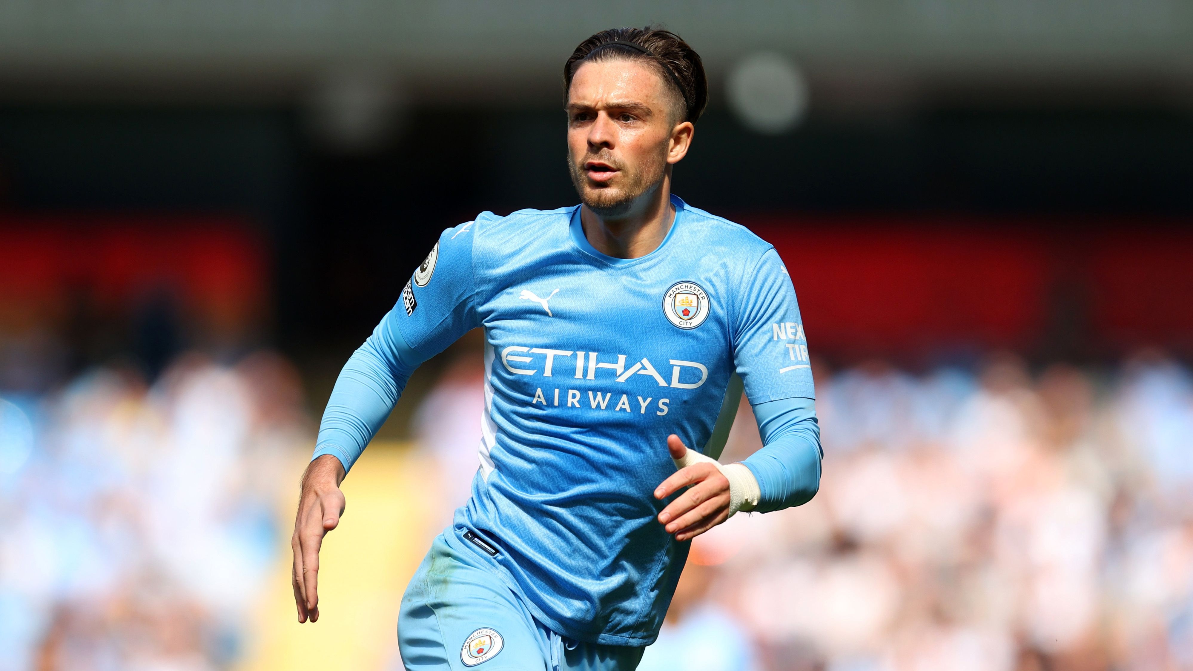 Jack Grealish de Manchester City pendant le match de Premier League entre Manchester City et Arsenal au Etihad Stadium le 28 août 2021 à Manchester, Angleterre.