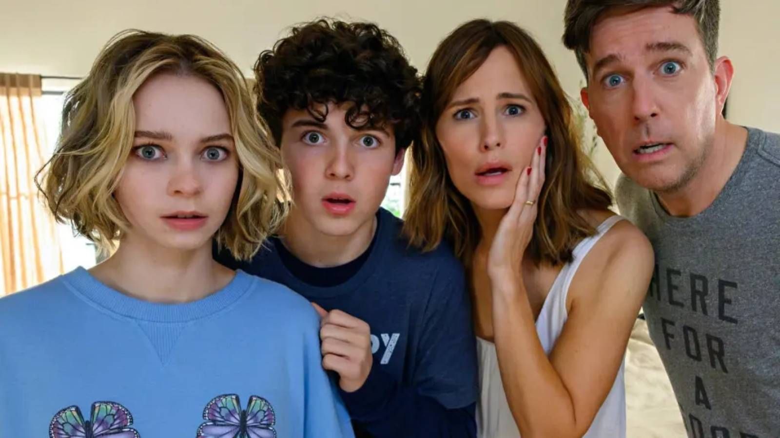 Jennifer Garner and Ed Helms, in Family Switch.