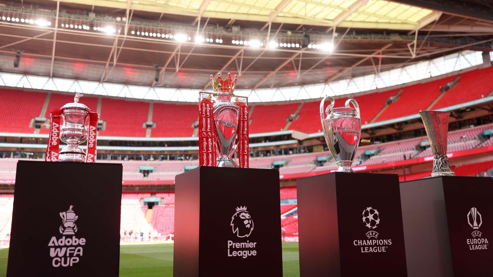 FAdobe WFA Cup, Premier League trophy, UEFA Champions League trophy and UEFA Europa League trophy inside Wembley Stadium