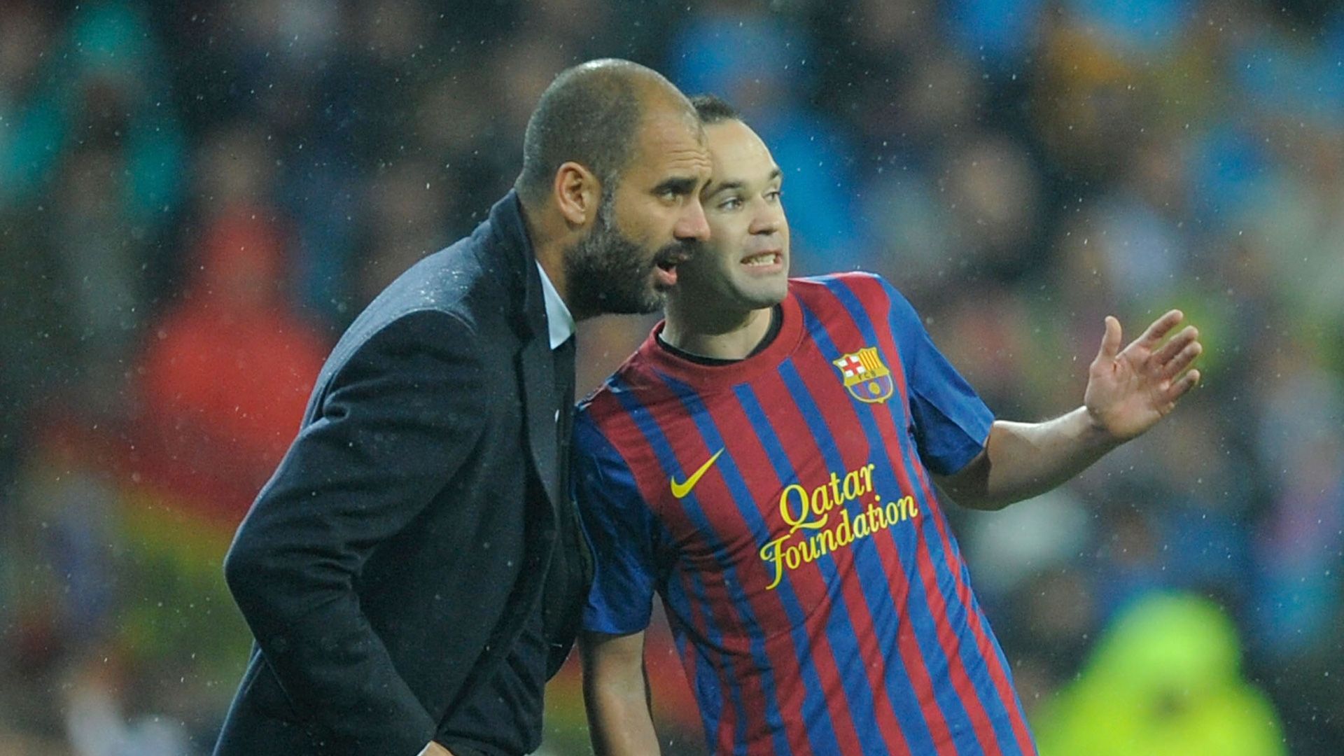 Guardiola Iniesta 09122011