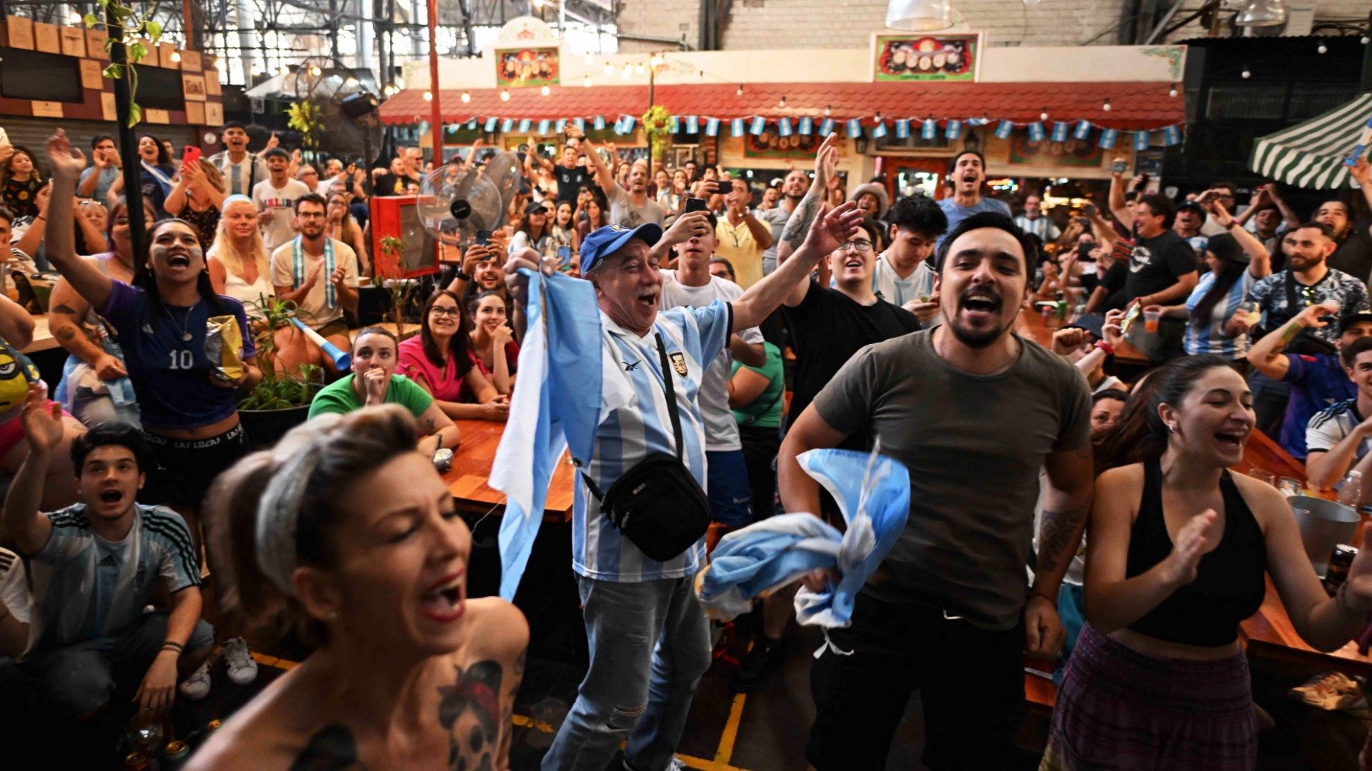 Argentina fans celebrate San Telmo Market Buenos Aires